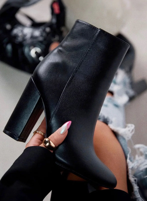 DORIS - Black imitation leather ankle boots with high heels