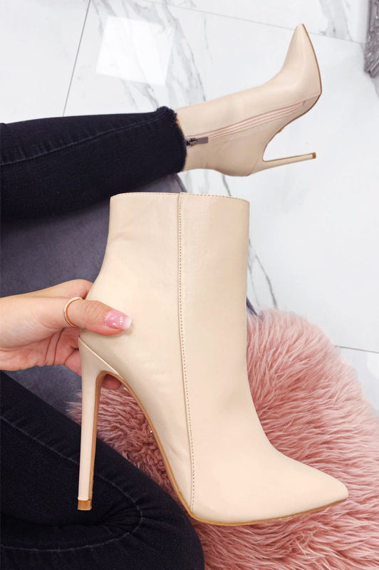 Beige ankle boots in faux leather with high heel