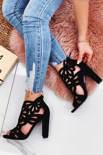 Black perforated sandals with comfortable heel