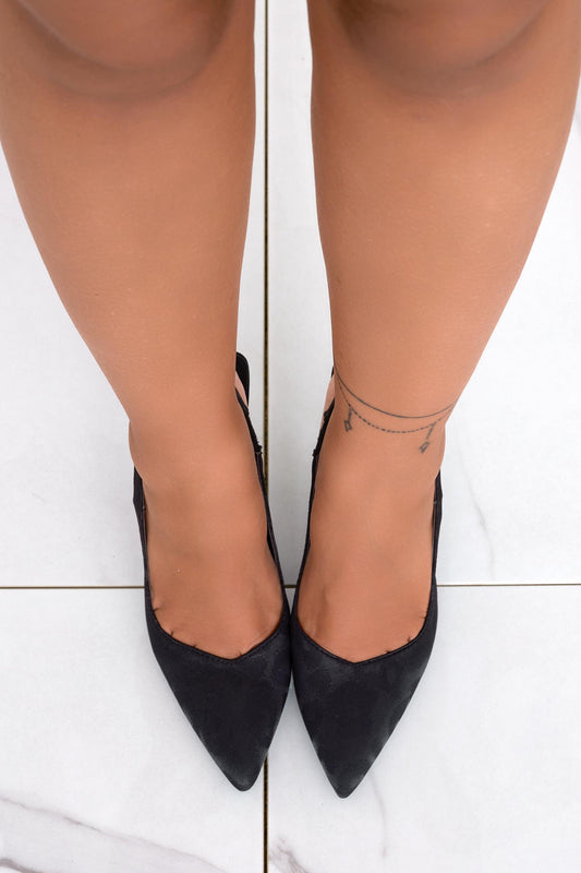 Black high-heeled pumps