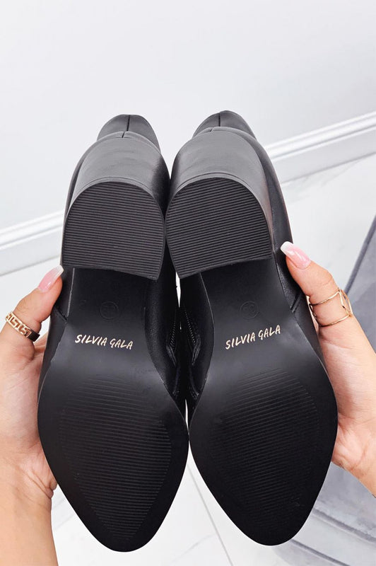 Botines negros de piel sintética con tacón cómodo