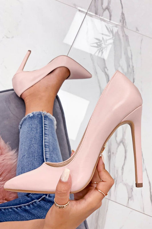 Pink faux leather pumps with high heel
