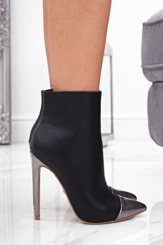 Black ankle boots with heel and grey patent leather toe