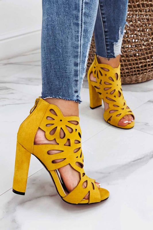 Yellow perforated sandals with comfortable heel