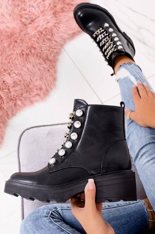 Bottines noires biker avec chaînes et strass