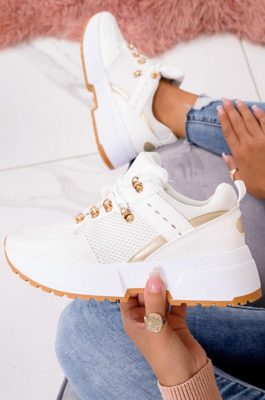White sneakers with thick sole and gold inserts