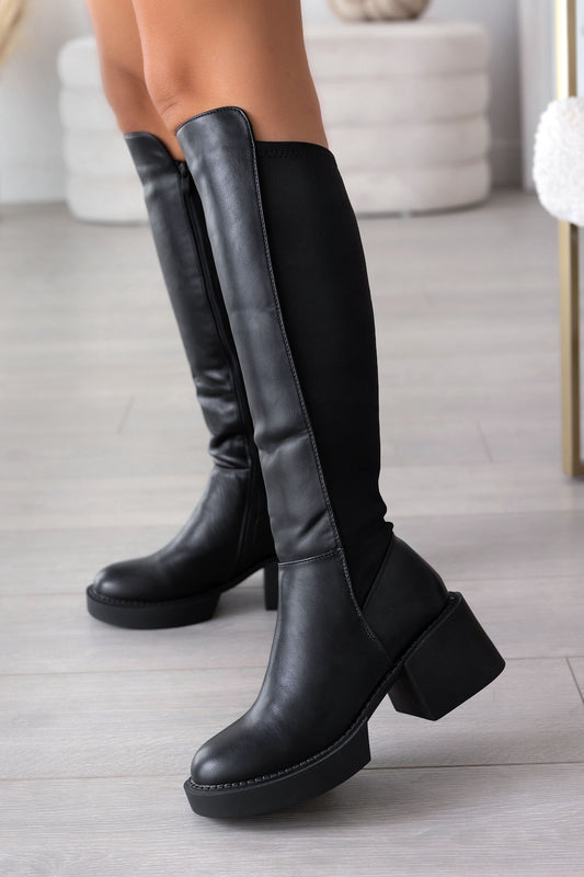 Black boots with elastic fabric on the back
