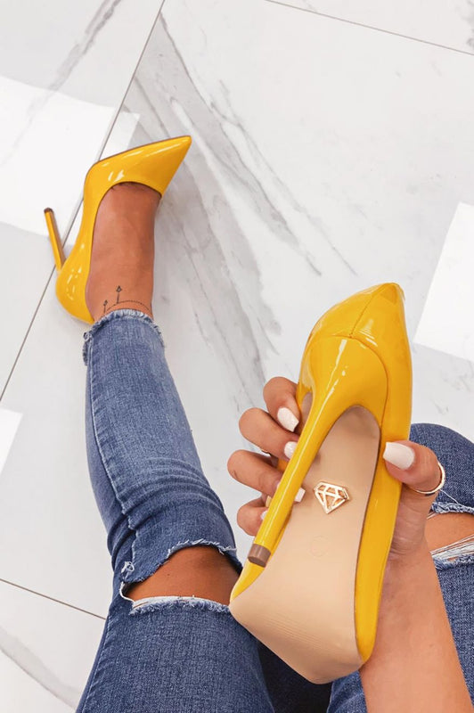Yellow patent leather pumps with high heel