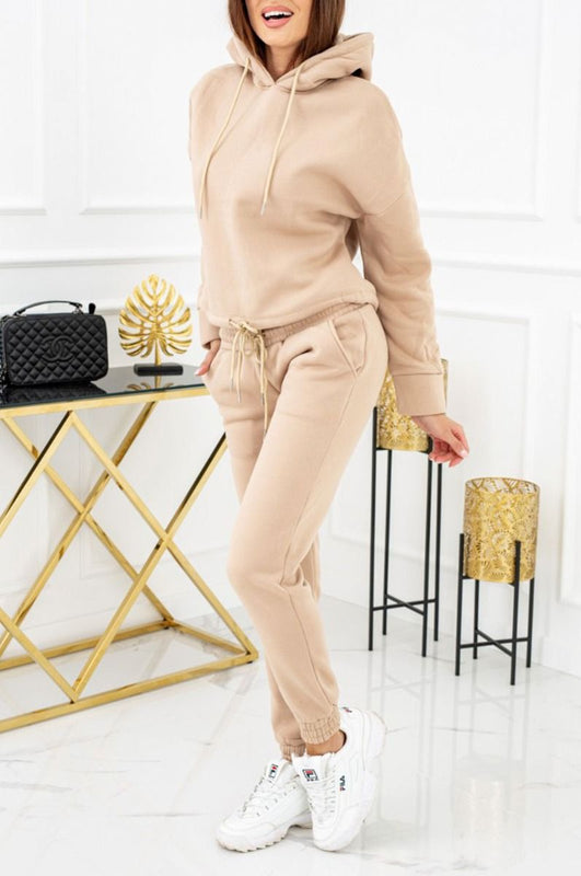 Mud-colored two-piece suit with laces and hood