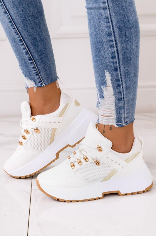 White sneakers with thick sole and gold inserts