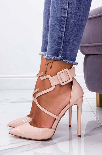 Pink patent leather pumps with stiletto heel and buckle