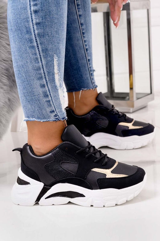 Baskets noires à semelle épaisse et inserts dorés