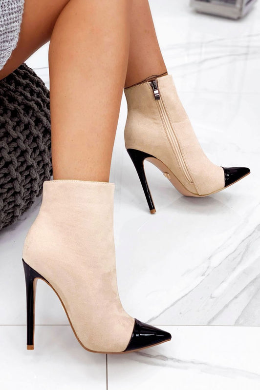 Beige suede ankle boots with heel and black patent leather toe