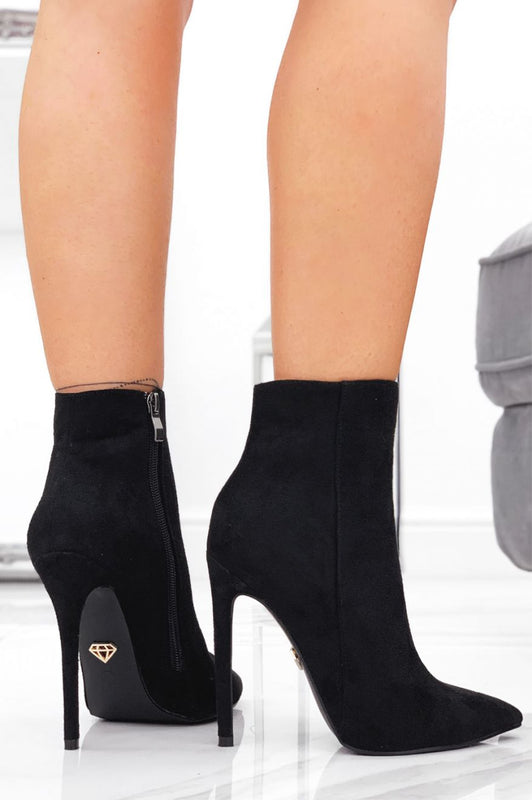 Black suede ankle boots with high heel