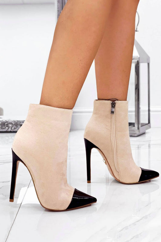 Beige suede ankle boots with heel and black patent leather toe