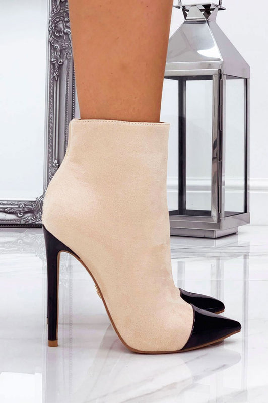 Beige suede ankle boots with heel and black patent leather toe
