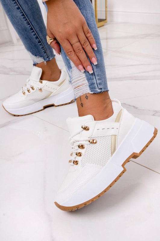 White sneakers with thick sole and gold inserts