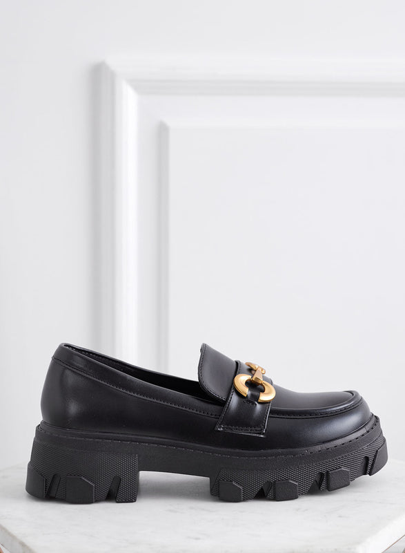 AGNESE - Black loafers with gold buckle