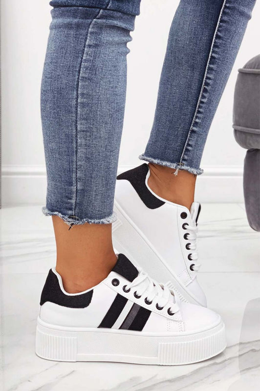White sneakers with laces and black glitter inserts
