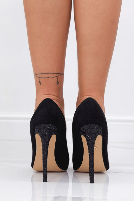 Black pumps with heel and glittered toe