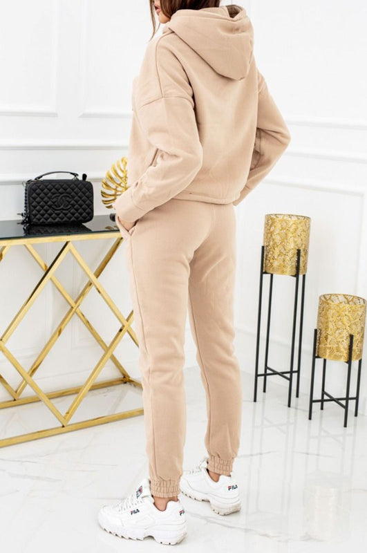 Mud-colored two-piece suit with laces and hood