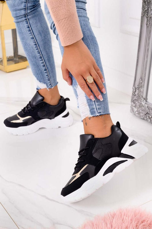 Baskets noires à semelle épaisse et inserts dorés