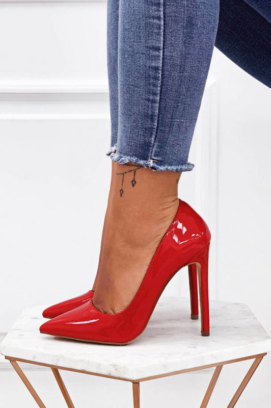 Red patent leather pumps with high heel