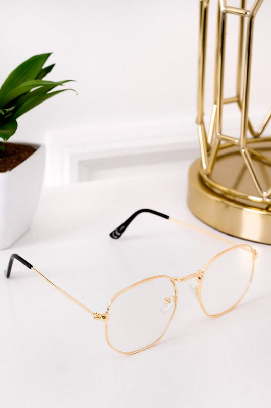 Glasses with clear lenses and gold frame