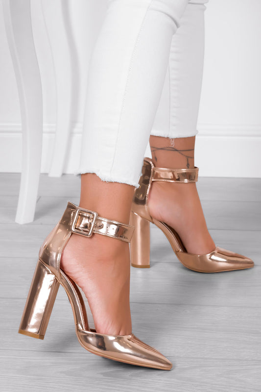 Rose gold patent leather pumps with strap and comfortable heel
