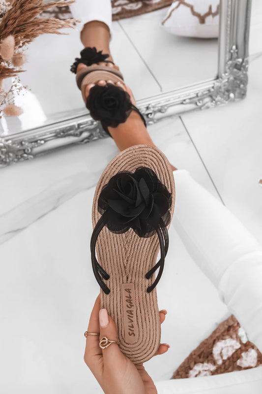 Black slide sandals with applied flower