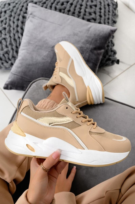 Beige sneakers with gold laminated inserts and laces