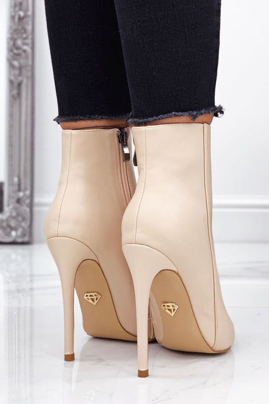 Beige ankle boots in faux leather with high heel