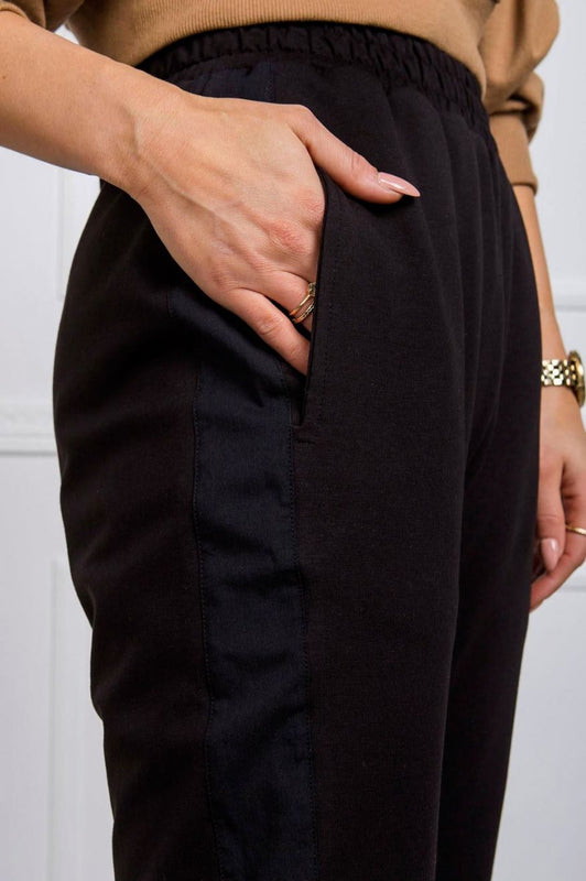 Pantalon de survêtement noir avec élastiques