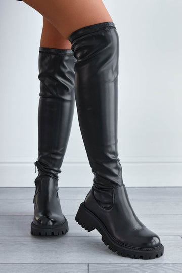 Black over-the-knee boots in faux leather